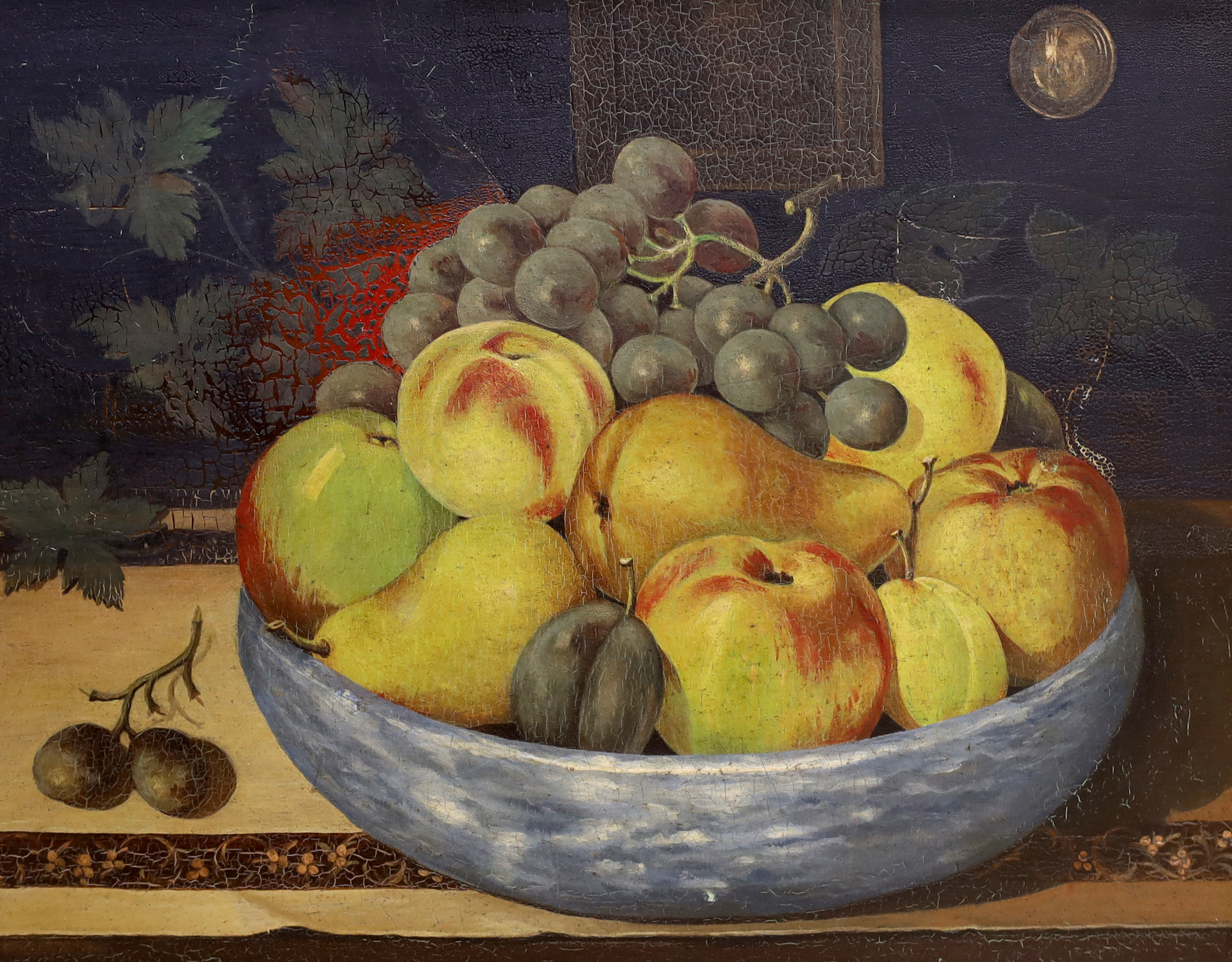 19th century Russian school, Icon, housed in an ebonised frame, together with a 17th century style, Dutch oil on board, Still life of fruit, largest 26 x 33cm